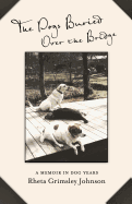 Item #282445 The Dogs Buried Over the Bridge: A Memoir in Dog Years [SIGNED]. Rheta Grimsley Johnson